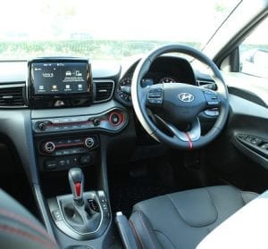 Hyundai Volester interior front driver view, steering wheel and center consul