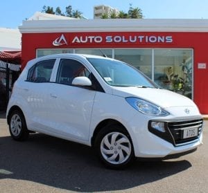 HYUNDAI ATOS side view, white color, in front of Auto Solutions Showroom